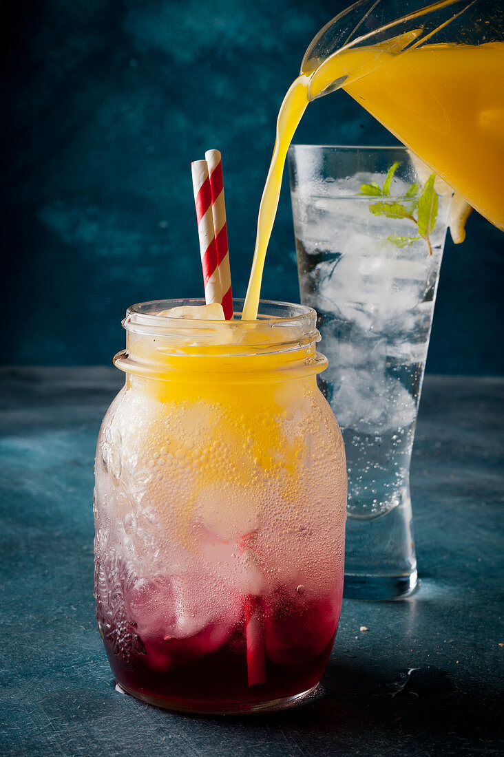 Mocktail with orange and cranberry juice