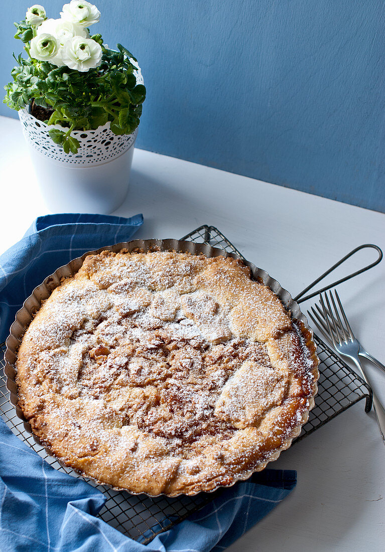 Apple pie covered with shortcrust pastry