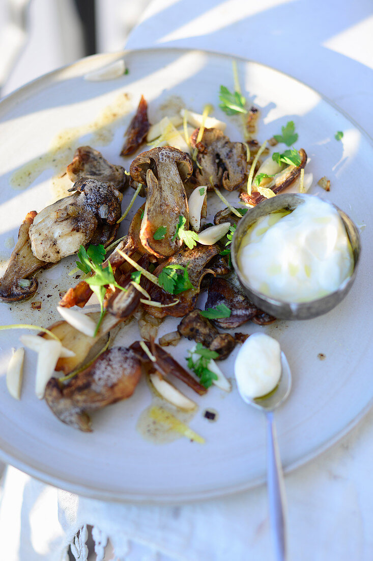 Fried porcini mushrooms with dates and green almonds (Turkey)