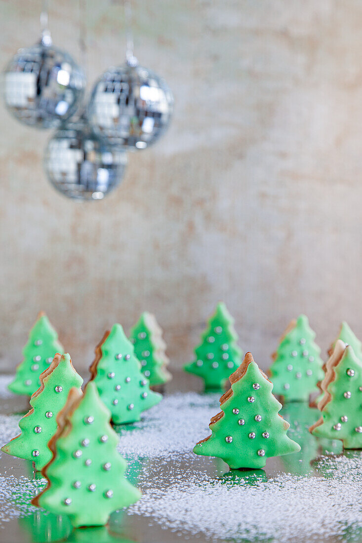Fir trees with green glaze and silver balls