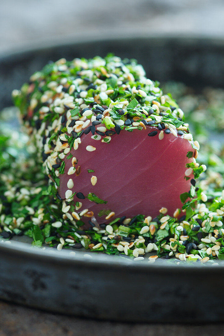 Tuna tataki in a herb and sesame seed coating (Japan)