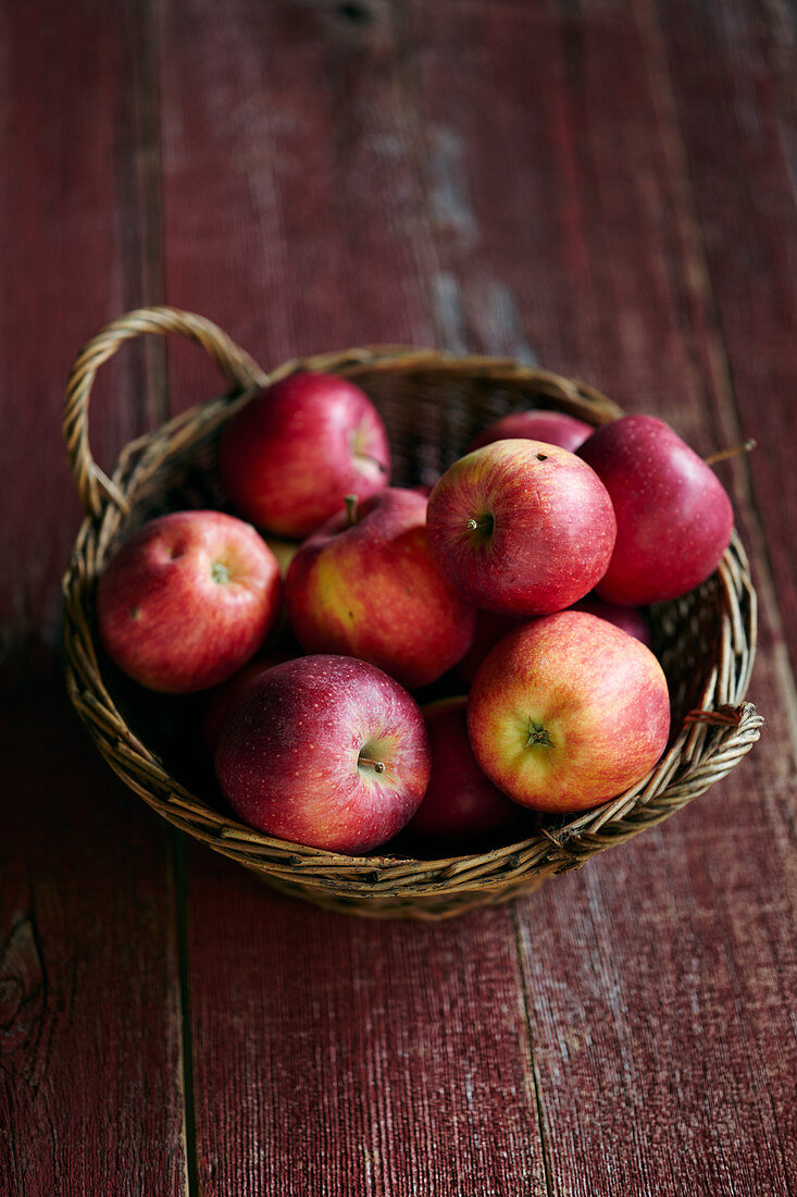 Fresh red 'Elstar' apples in a wicker basket