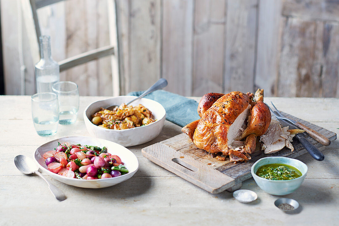 Roast chicken with brown-butter basted radishes and asparagus with salsa verde