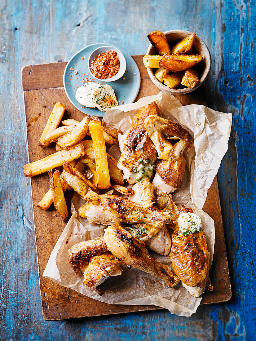 Quick roast chicken and homemade oven chips with Kiev butter