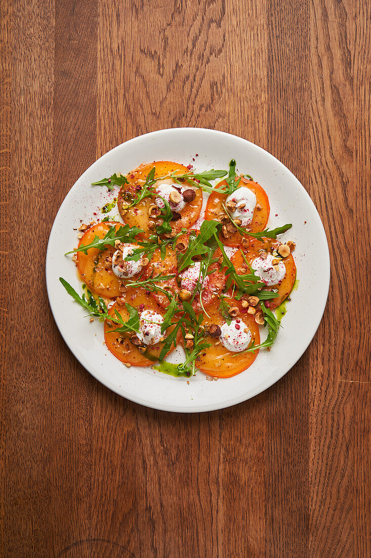 Stylish served salad with tomatoes and herbs