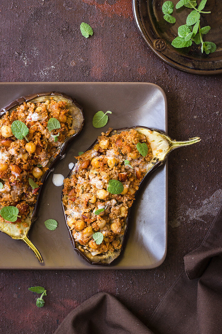 Aubergines stuffed with cous cous and chickpeas, fresh mint, yogurt