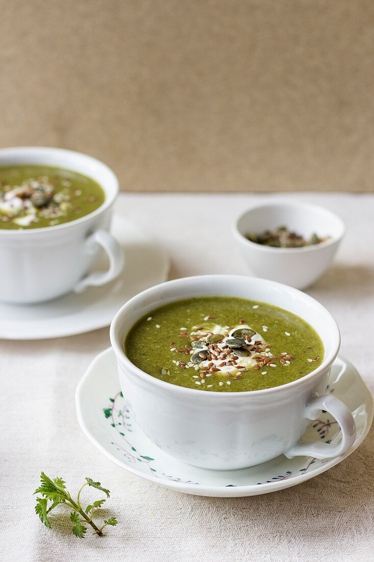Nettle soup with yogurt and seeds