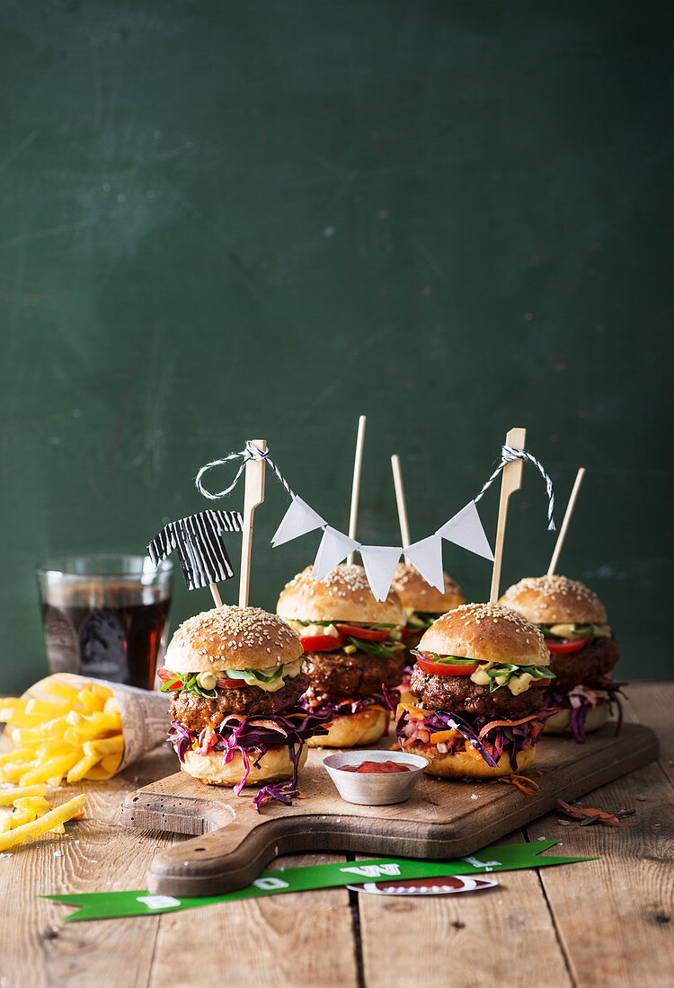 Burgers with chips for a Super Bowl party