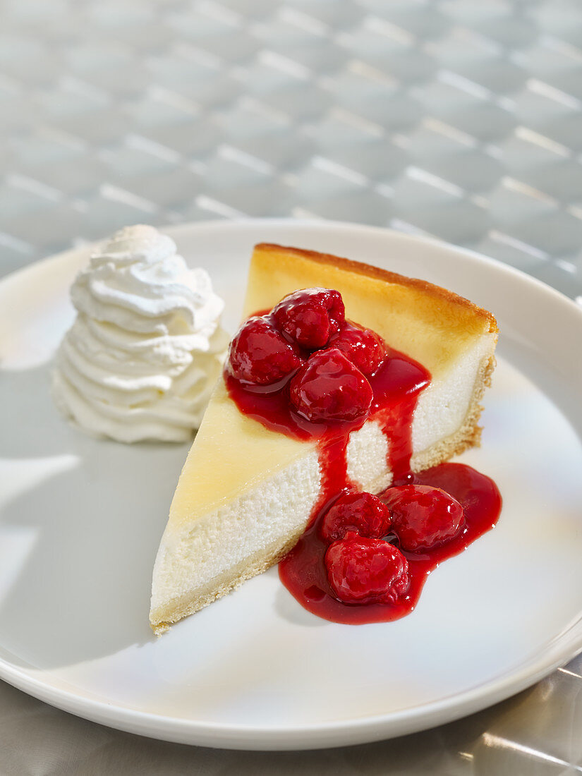 Baked Raspberry Cheesecake with whipped cream