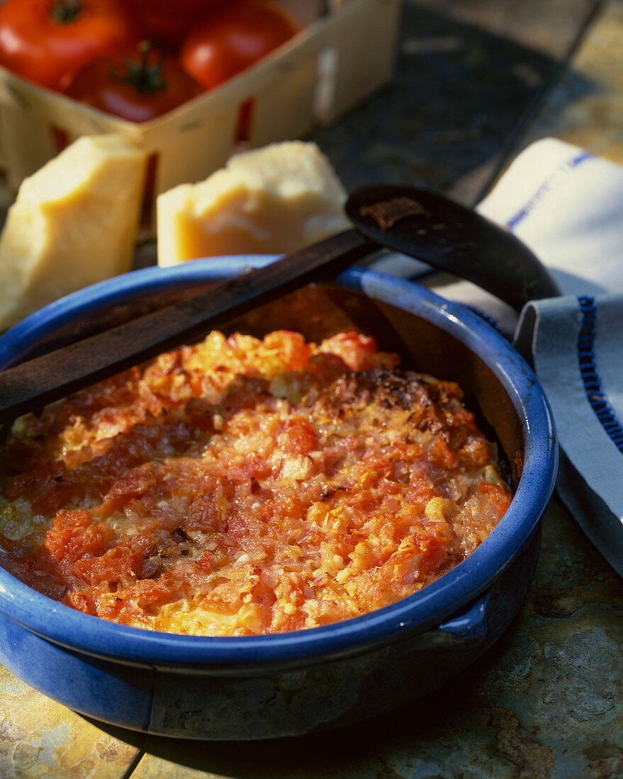 Tomato and potato gratin with Parmesan cheese