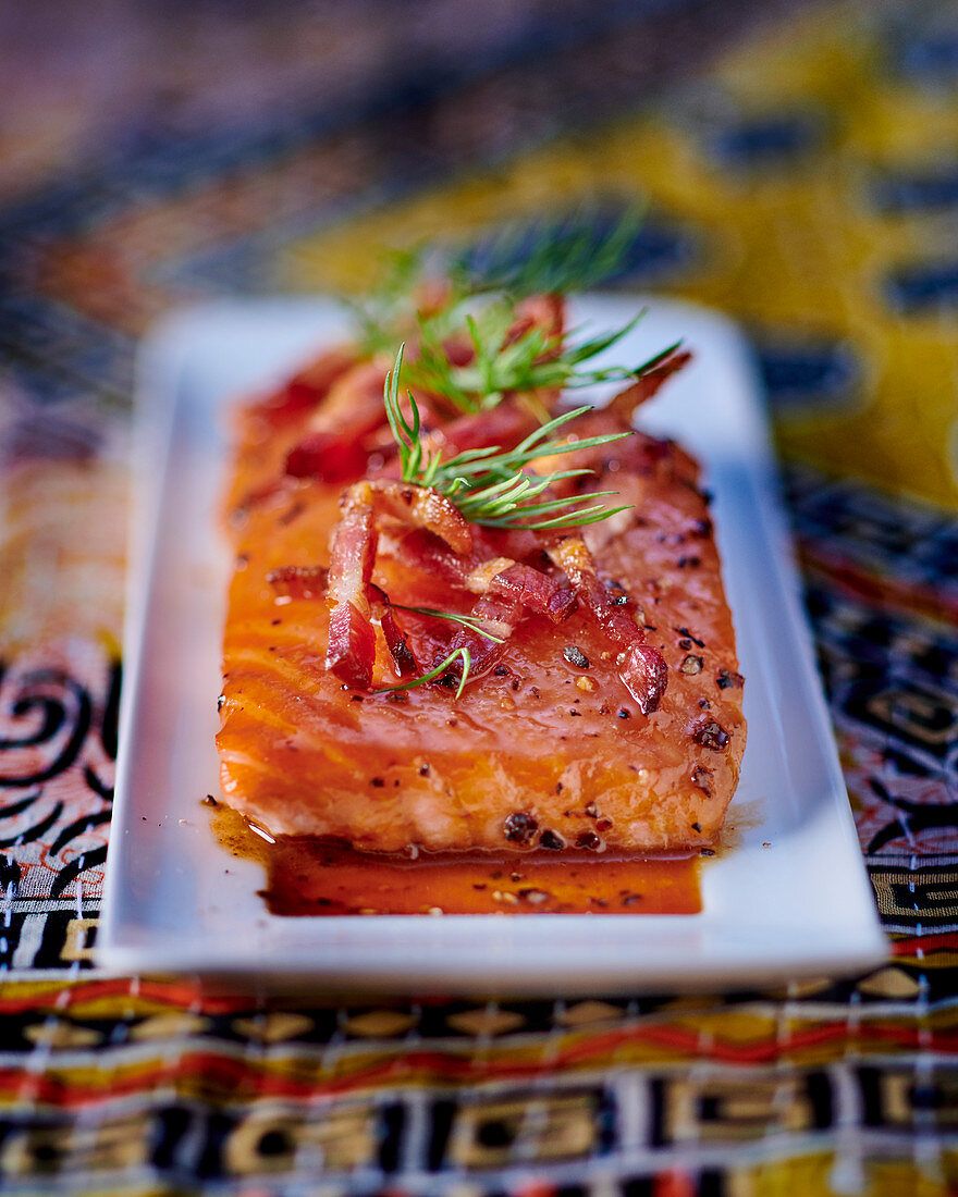 Caramelised salmon with cider and bacon