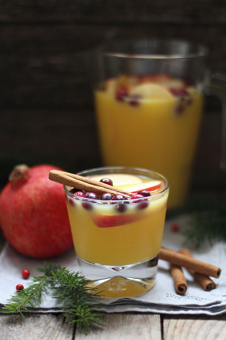 Winter orange punch with cinnamon and fruit