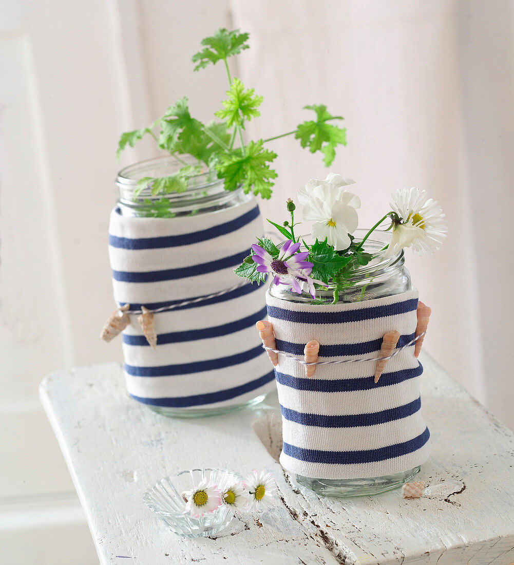 Vase covers made from arms of striped shirt