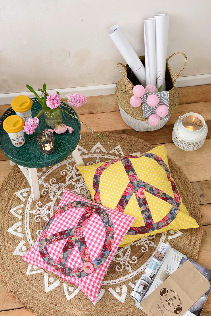 Cushions with appliqué peace symbols