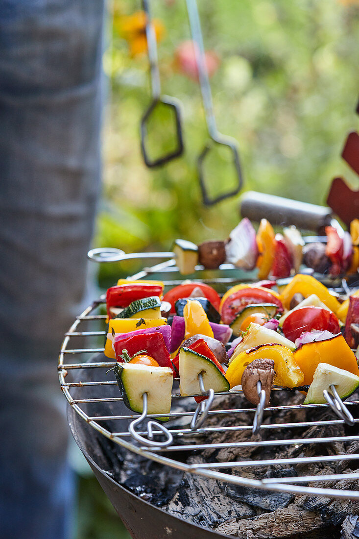 Vegan vegetable kebabs on a barbecue