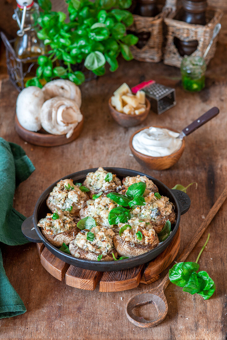 Stuffed baked mushrooms with chicken and cheese