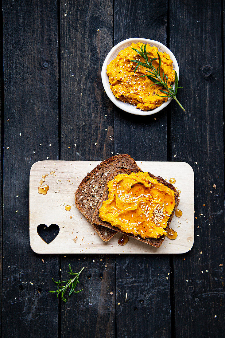 Pumpkin hummus on whole wheat bread