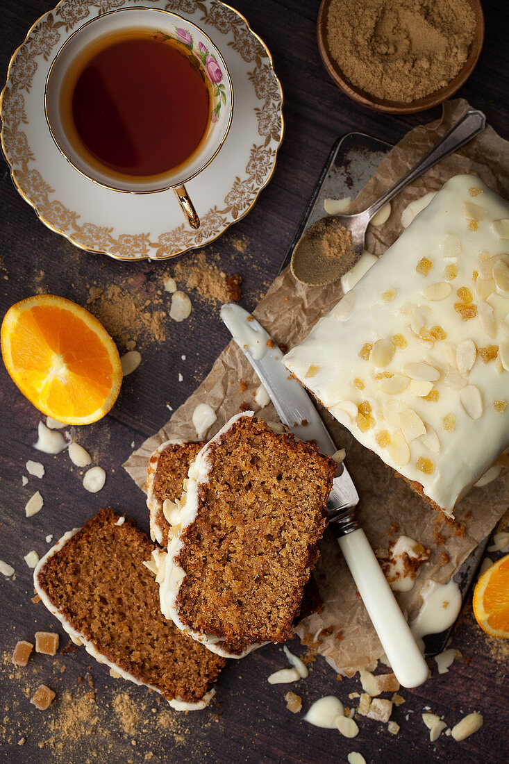 Overhead view of Sliced Vegan Orange and Ginger Cake with Glace Icing