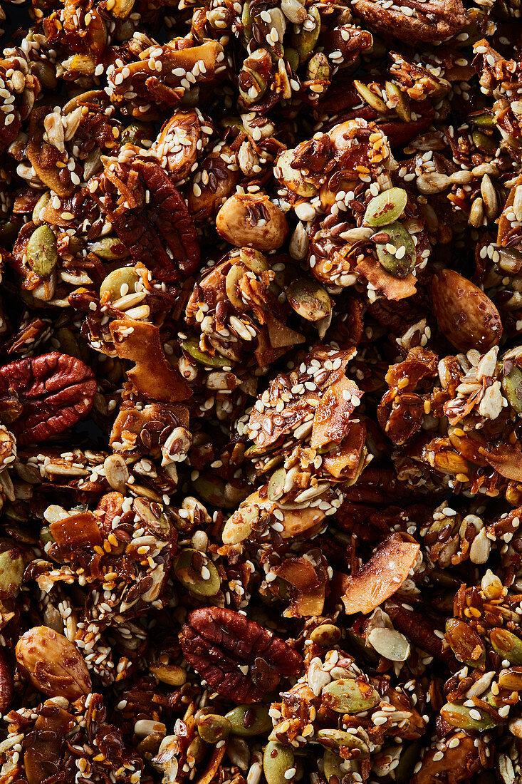 Caramelised granola with seeds, nuts and white sesame seeds