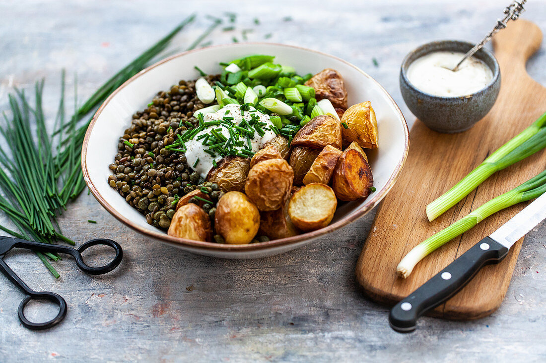 Roast potatoes with lentils, spring onions and chive mayonnaise