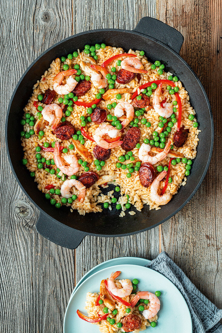 Paella with sausages and prawns