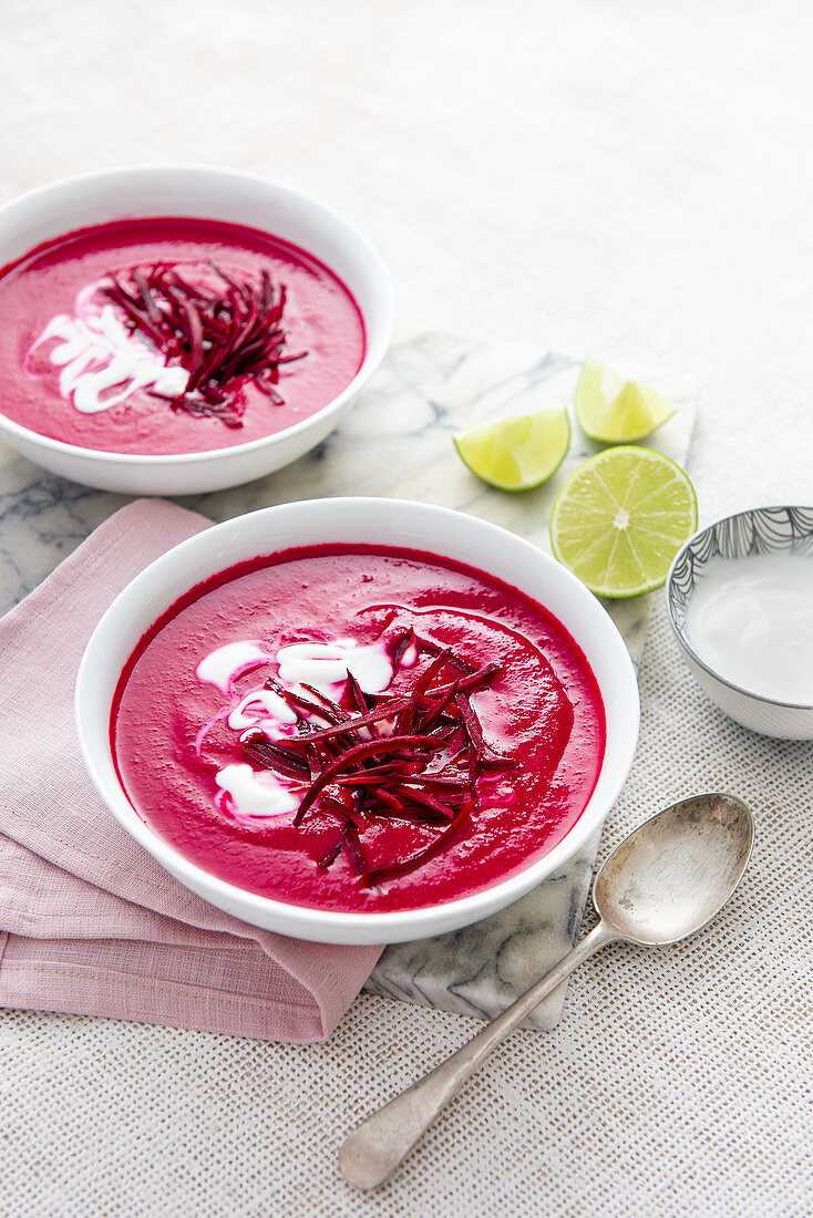 Vegan beetroot and coconut soup with lime, chilli and coconut yoghurt