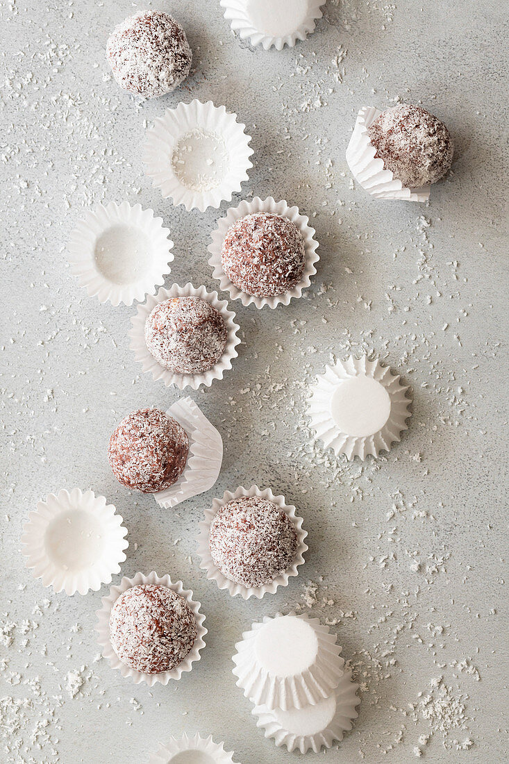 Coconut truffles in patty papers.
