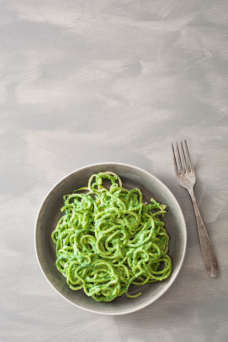 Courgette noodles with vegan rocket and cashew nut pesto