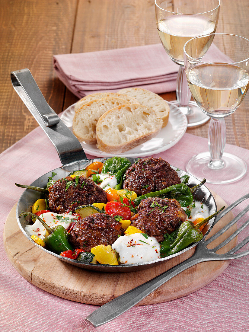 Meatballs with pimientos de padrón and buffalo mozzarella