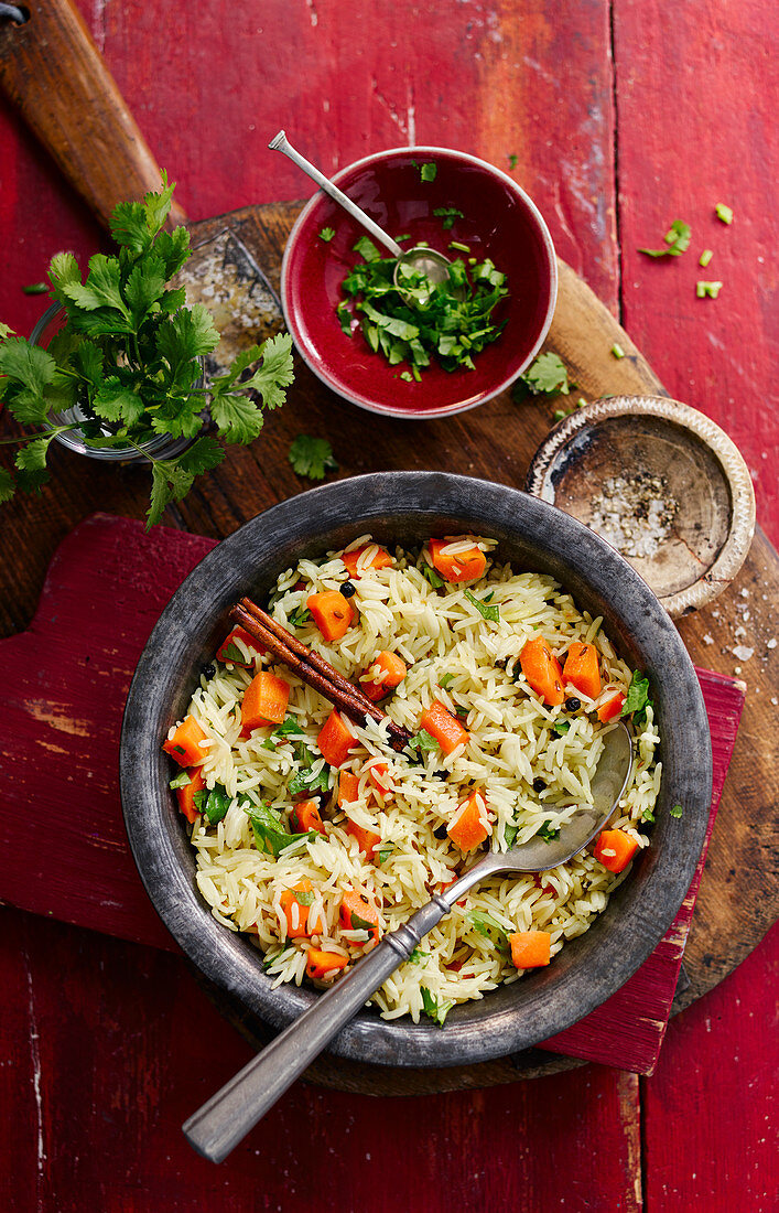 Pilau rice with carrots, spices and coriander (India)