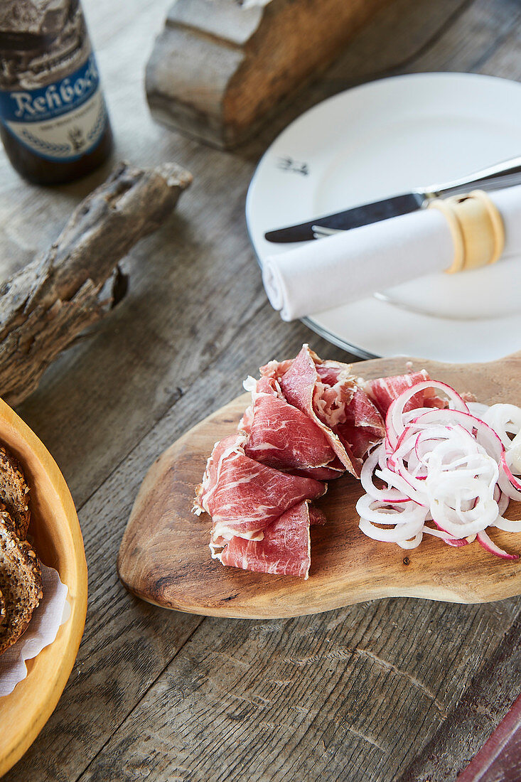 Smoked ham on a bread board