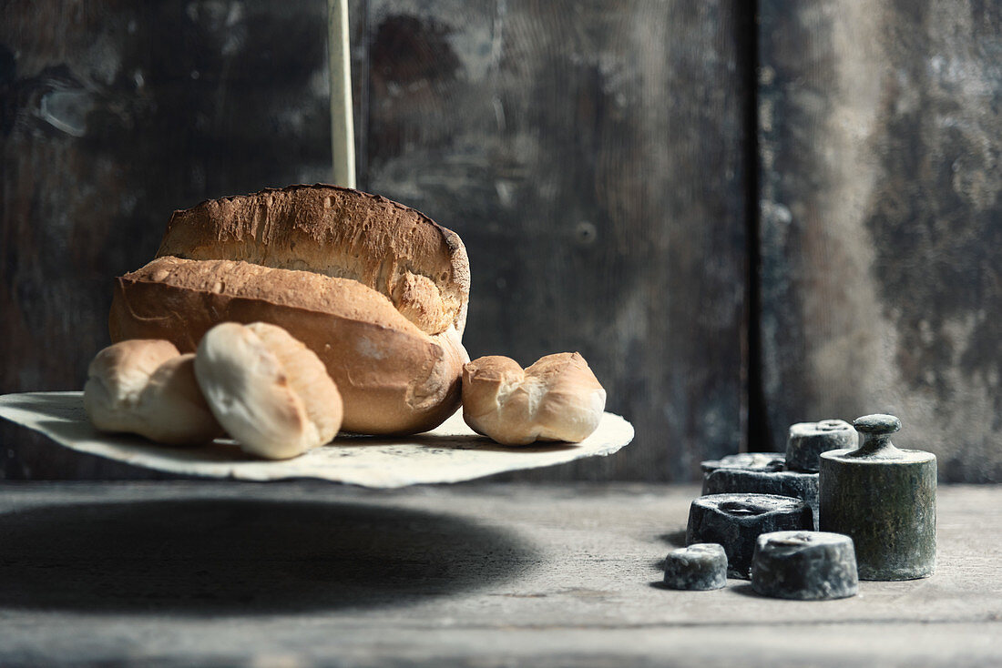 Fresh bread and rolls on a scale