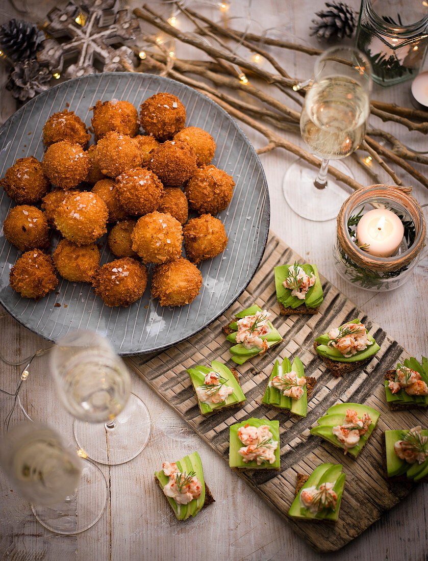 Rarebit and pickled onion croquettes and Prawn canapés with avocado