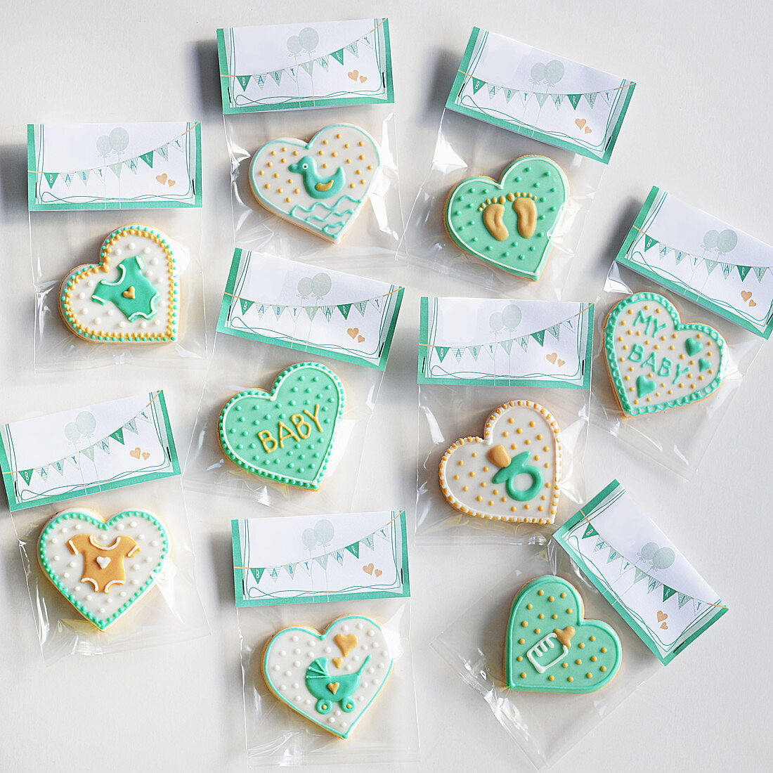 Motif cookies for a baby party, packed in sachets for gifting