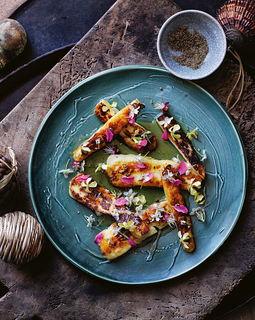 Grilled haloumi with honey and wild flowers