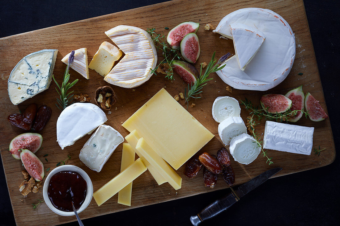 Cheese platter with figs, dates and walnuts