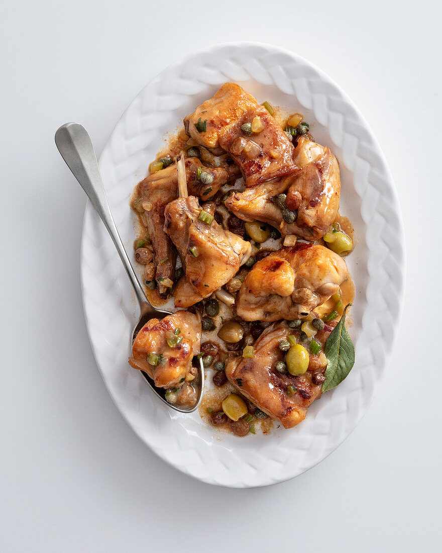 Sicilian style sweet and sour rabbit with olives and capers