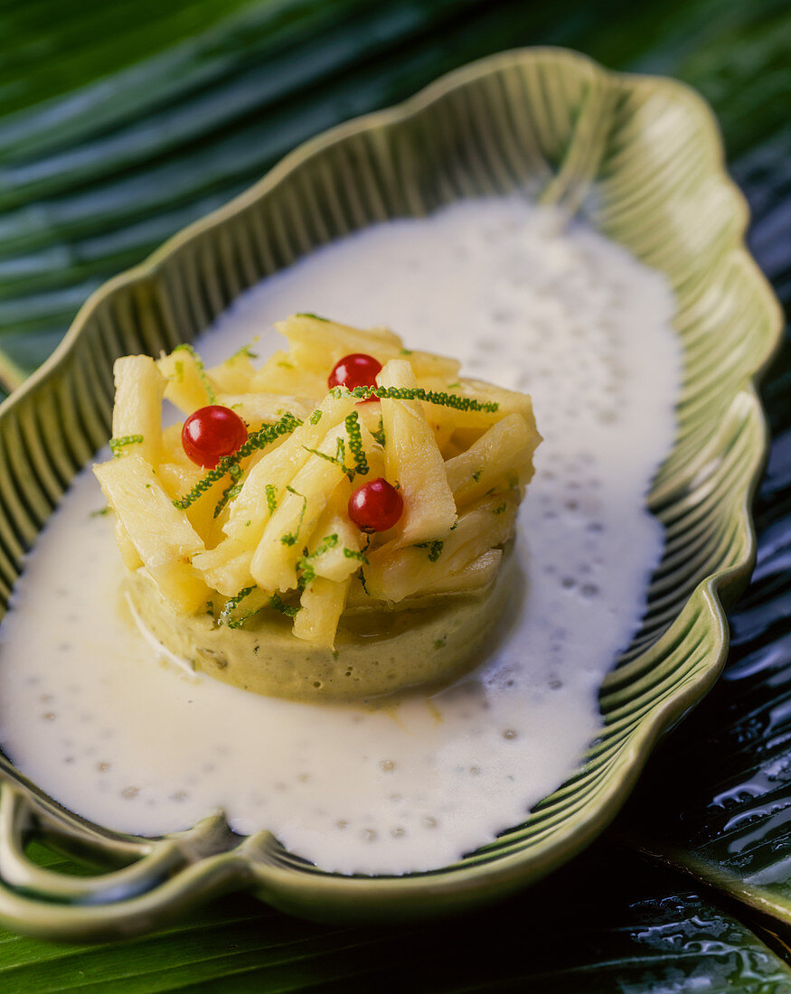 Pistachio flan with pineapple salad in tapioca coconut pudding