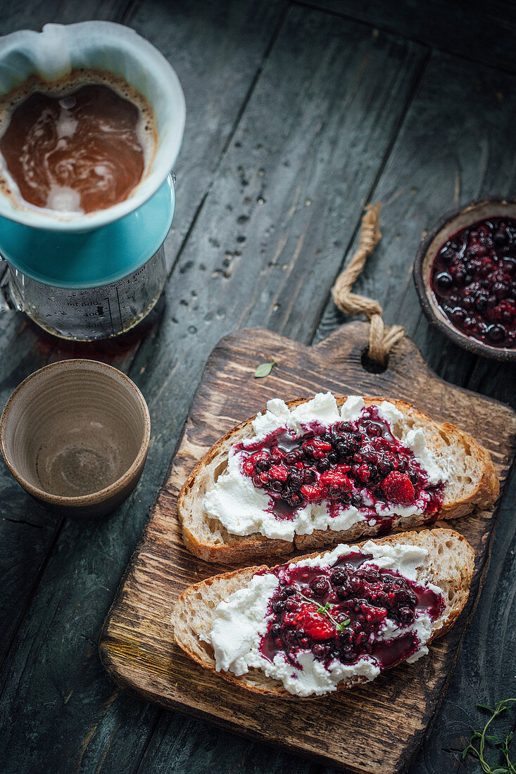 Sourdough toasts with ricotta and berries and filter coffee