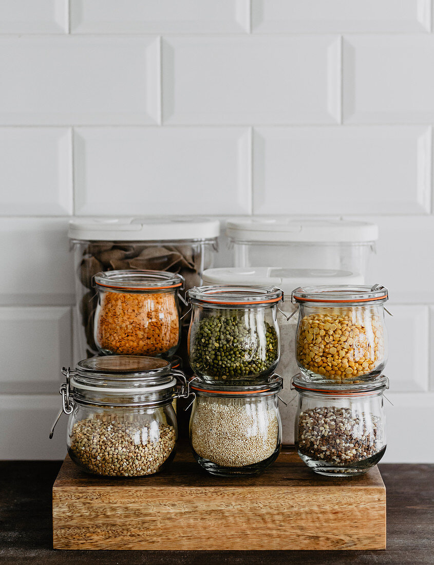 Kitchen jars with beans and groats