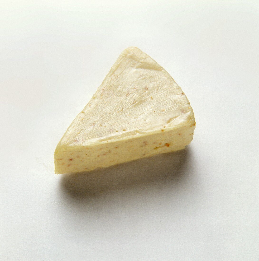 Triangle of a spreading processed cheese 