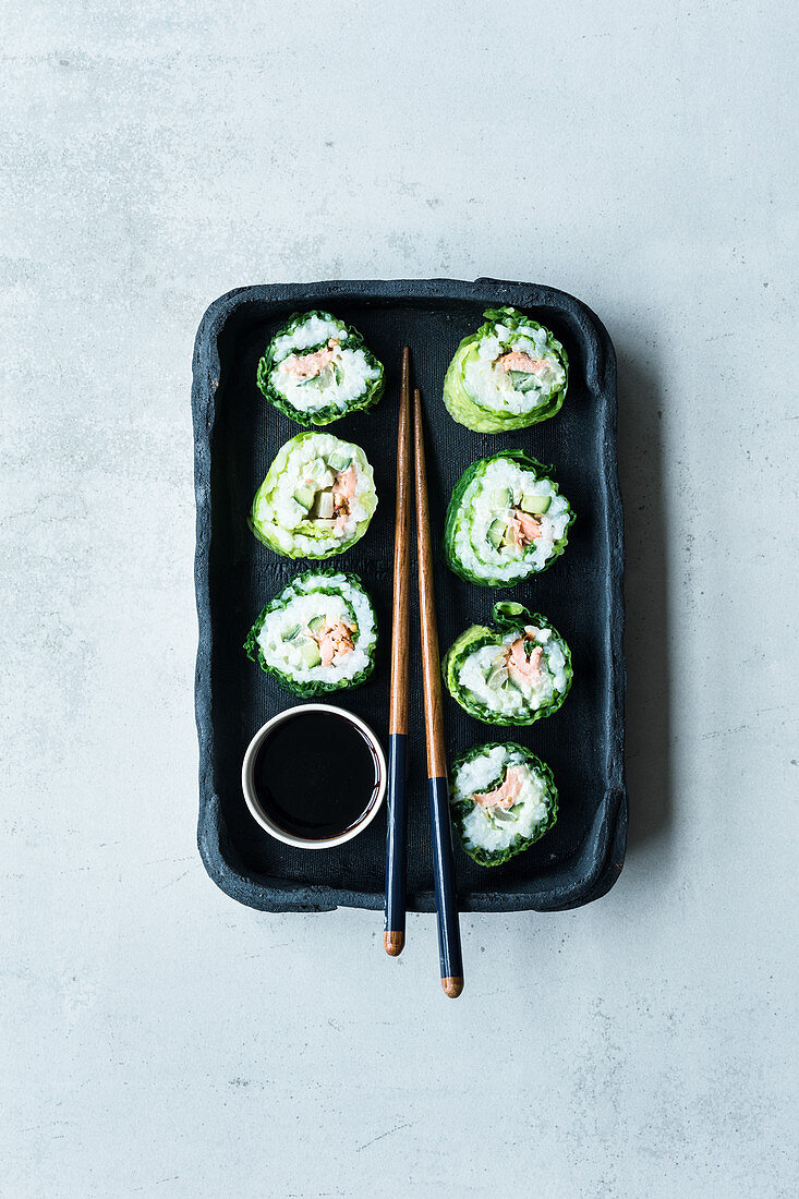 Savoy cabbage and salmon sushi