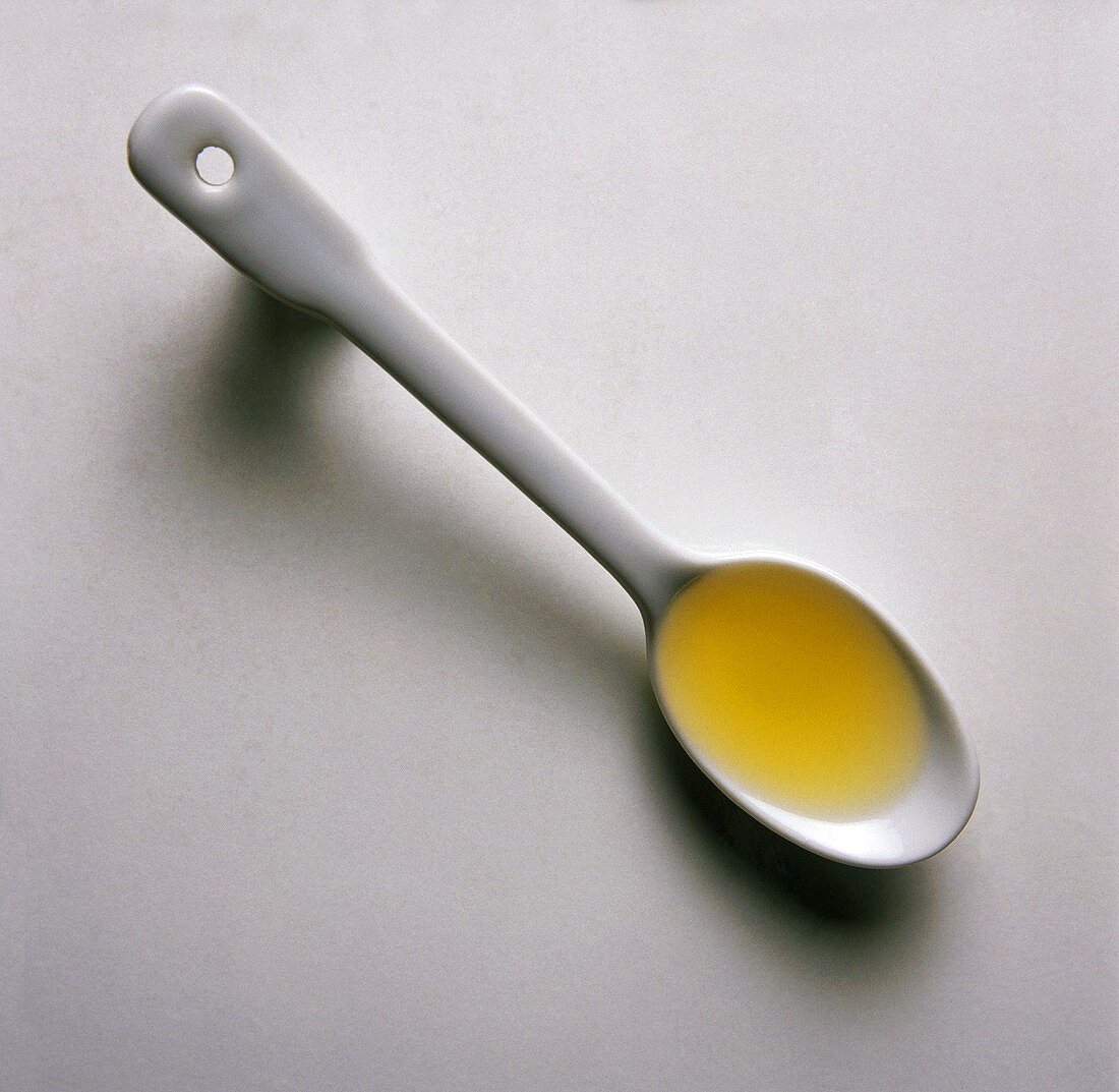 Walnut oil on china spoon