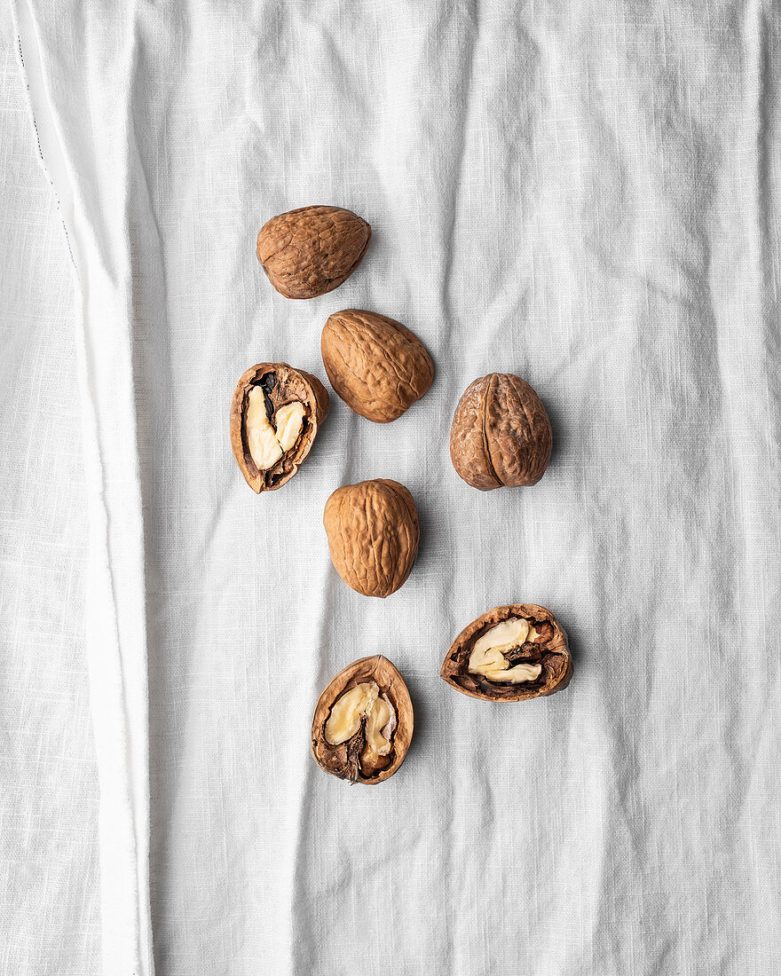 Walnuts on white linen