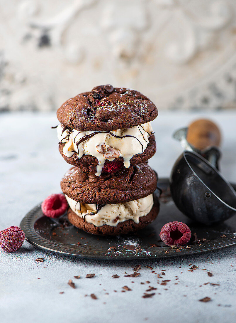 Chocolate ice cream sandwich with raspberries