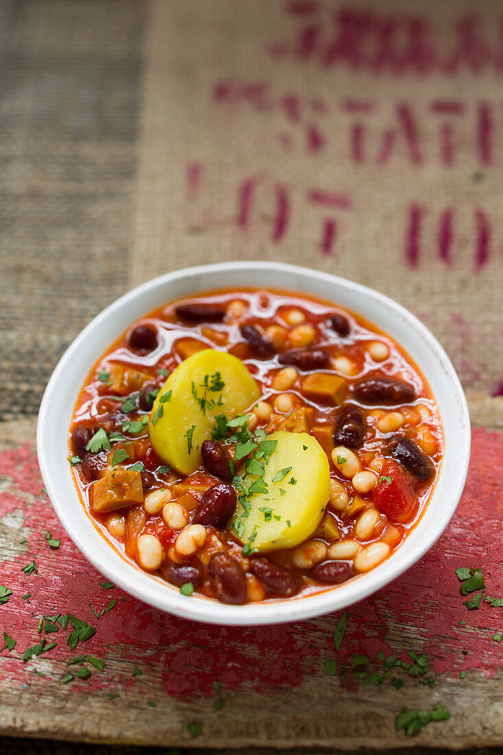 Vegan bean stew with seitan and potatoes
