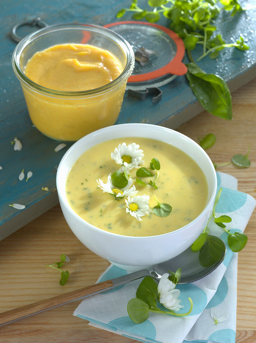Vegetable cream soup with wild herbs