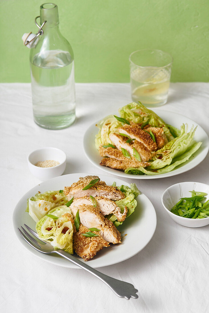 Sesame chicken salad with lettuce wedges and honey dressing