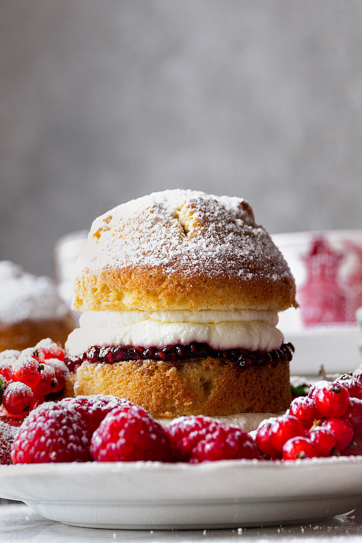 Victoria Sponge Cake with raspberry jam and whipped cream