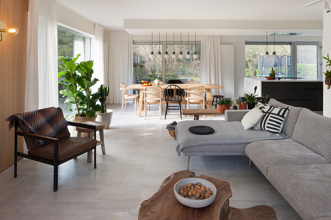 Bright living room with dining area and view of the garden